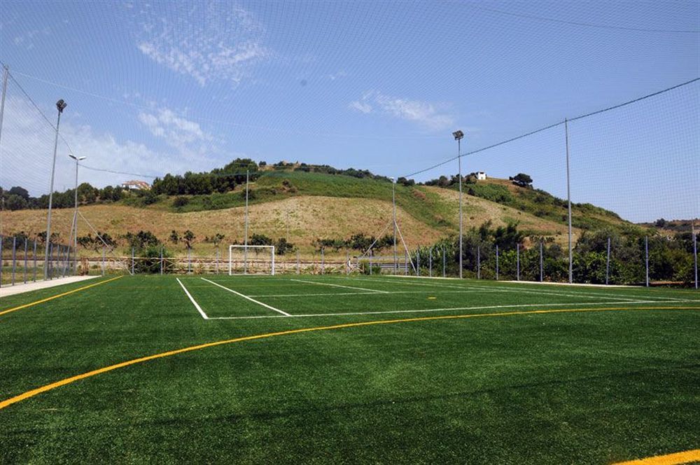 Baia Dei Canonici Aparthotel Villaggio Le Rocelle Bagian luar foto